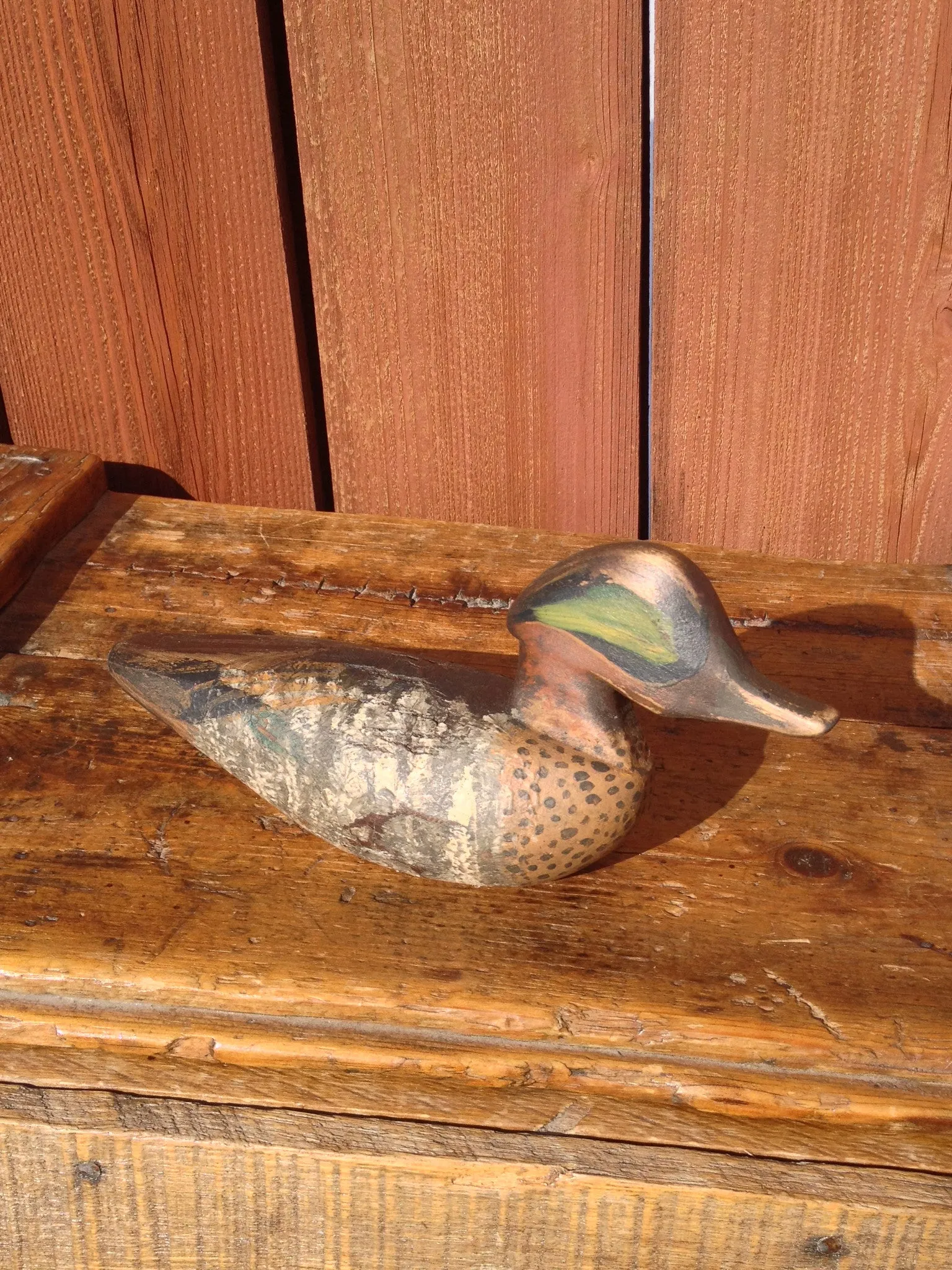 Attractive Hand Carved and Painted Duck with green feathers